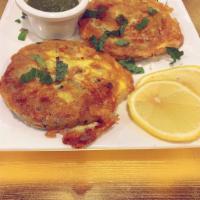 Shami Kabab · Small cutlets of minced chicken and dal mixed with special herbs. Served with raita.