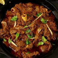 Gulberg Special Goat Karahi · Fresh goat  cooked in a specially seasoned mix of spices and herbs.