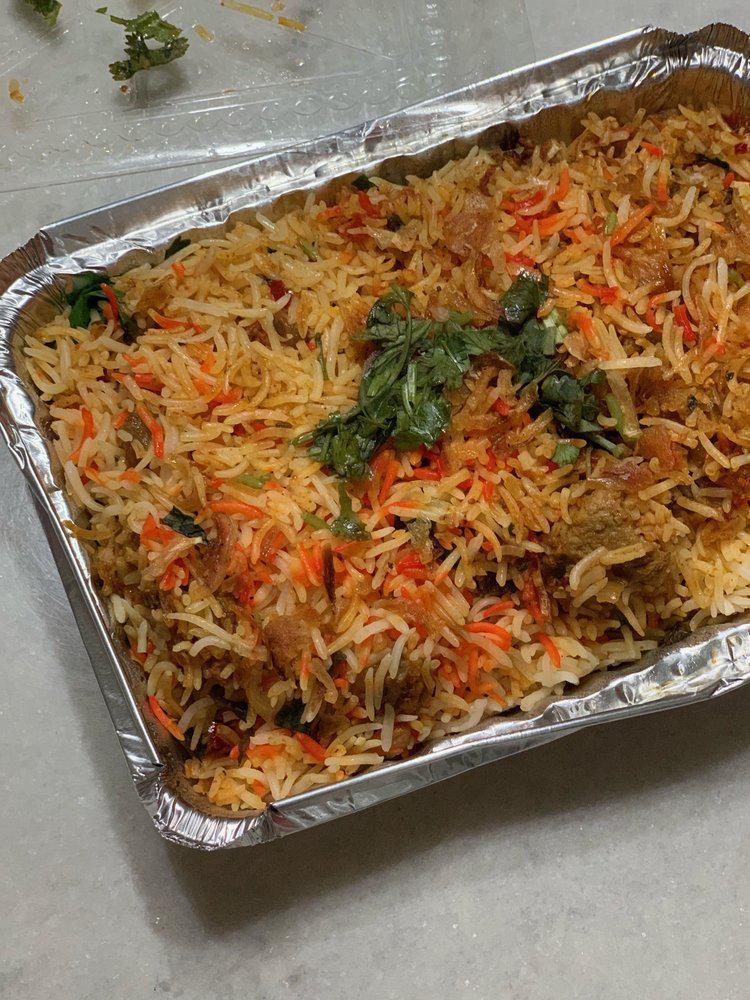 Goat Biryani · Basmati rice cooked in a special blend of goat, spices and herbs.