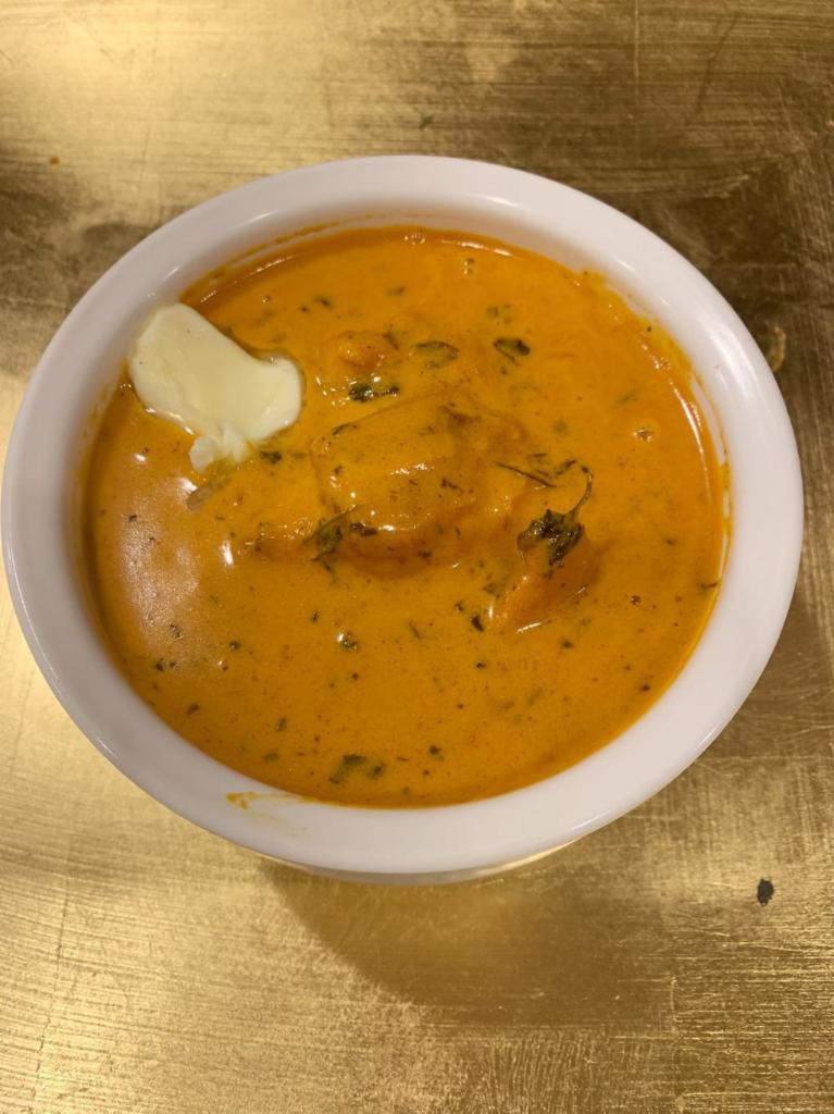 Murgh Makhani · Boneless chicken cubes cooked in a special cream sauce.