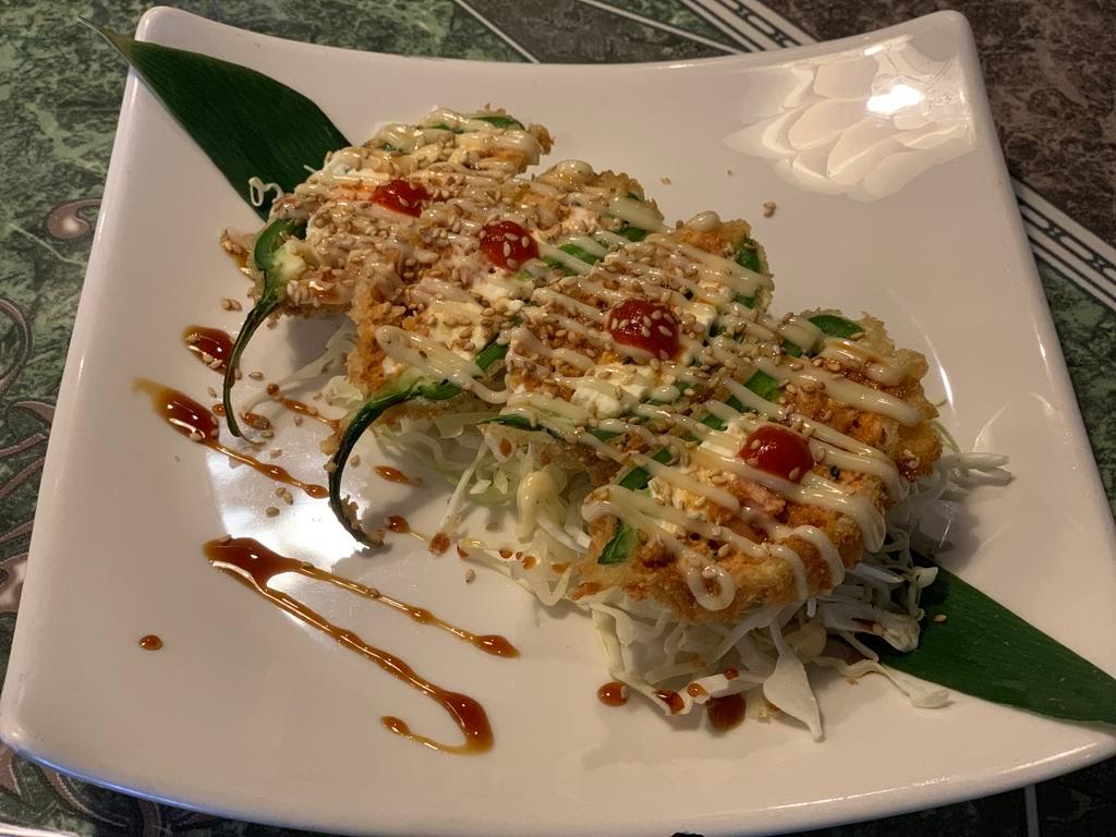 Jalapeno Bomb · Jalapeno filled with cream cheese and spicy tuna. Spicy.