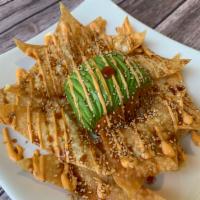 Red Dragon Sphere · Spicy tuna wrapped on avocado with wonton chips. Spicy.