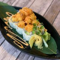 Popcorn Lobster Roll · Langostino panko, spicy mayonnaise, California roll, and eel sauce.