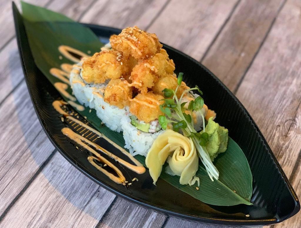 Popcorn Lobster Roll · Langostino panko, spicy mayonnaise, California roll, and eel sauce.