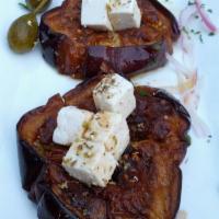 Melanzane Al’Aceto · Tender fried eggplant, garlic, oregano, ricotta salata and aged balsamic.