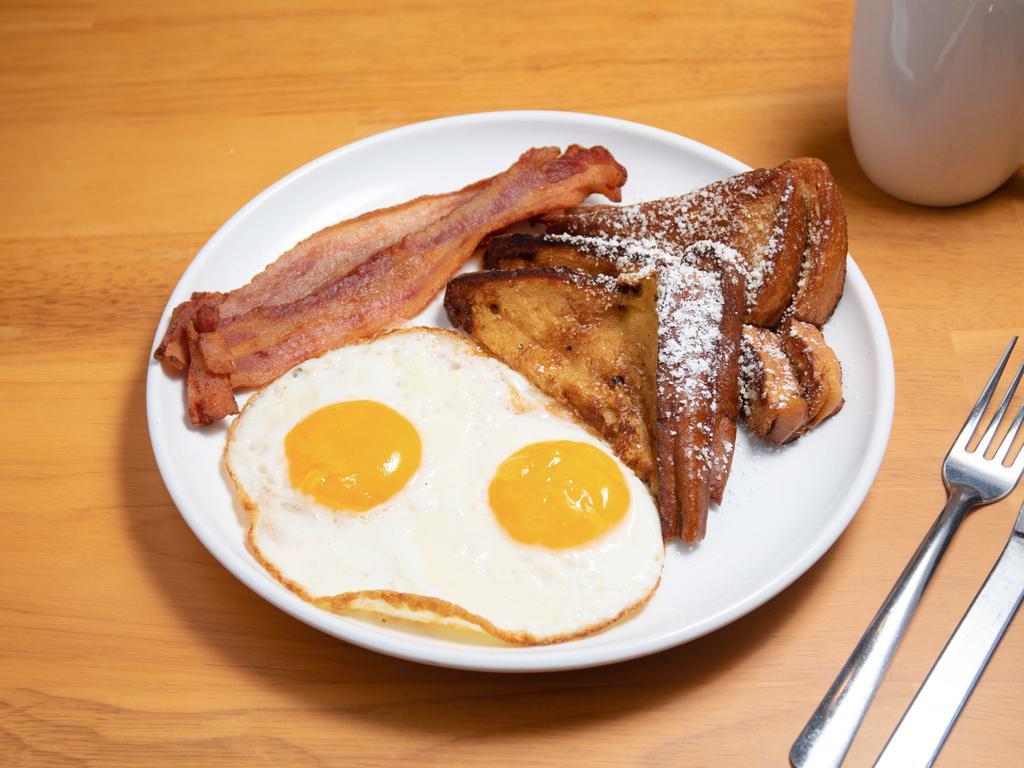 #1. Breakfast Combo · 2 French toast, 2 eggs and your choice of bacon, sausage or ham.