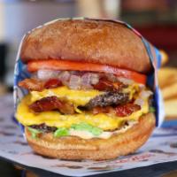 Old Fashion Burger · A double 1/6 lb. burger patty with 2 slices of American cheese, 2 slices of bacon, diced car...