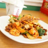 Triple Delight · Jumbo shrimp, beef, chicken with broccoli, straw mushrooms. Baby corn, water chestnuts, bamb...