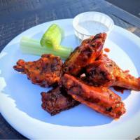 Wings · Bone-in Rocky Free Range Chicken Wings. 
Smoked in House with a Spicy Dry-Rub. Served with C...