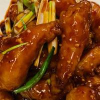 Mandarin Fried Prawns Dinner · Cooked in a sweet orange flavored brown sauce. Hot and spicy.