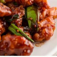 Mandarin Fried Chicken Dinner · Cooked in a sweet orange flavored brown sauce. Hot and spicy.