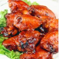 They Say Wings · Tossed in your choice of They Say BBQ sauce, flaming hot, tangy zesty, sweet chili, or Cajun...