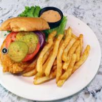 They Say Fried Chicken Sandwich · Juicy house-made battered fried chicken breast topped with tomato, onion, pickles, lettuce, ...