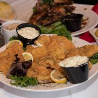 Seafood Tray · 2 lbs of catfish nuggets, 2 lbs of popcorn shrimp, 2 lbs of hush puppies, and 5 corn on the ...