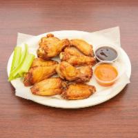 10 Dundee Wings · Succulent fresh chicken wings, covered in your favorite sauce. Choose from honey BBQ, mild, ...