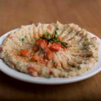 Eggplant Salad · Char-grilled eggplant puree with garlic, onion, roasted red pepper, herbs, tomatoes and pars...
