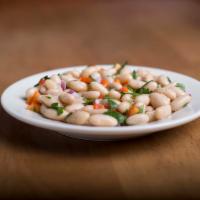 Piyaz · White beans, red peppers, parsley, onions, vinegar and oil.