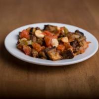 Mixed Eggplant · Fried small pieces of eggplant mixed with garlic and tomato sauce.