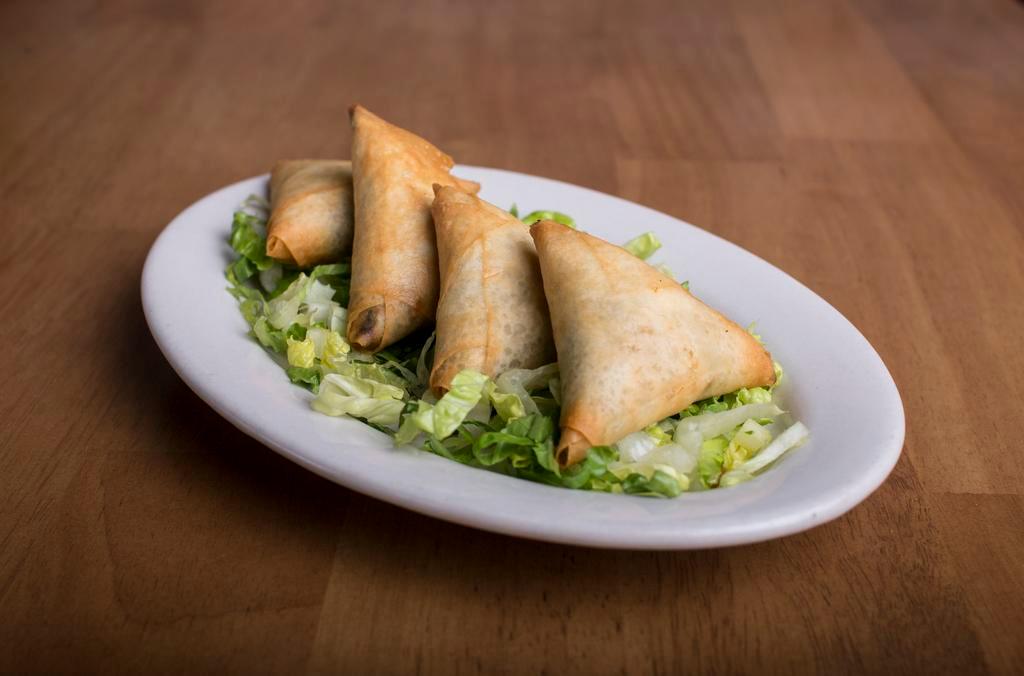 Spinach Borek · Fried phyllo dough stuffed with spinach, onion and cheese.