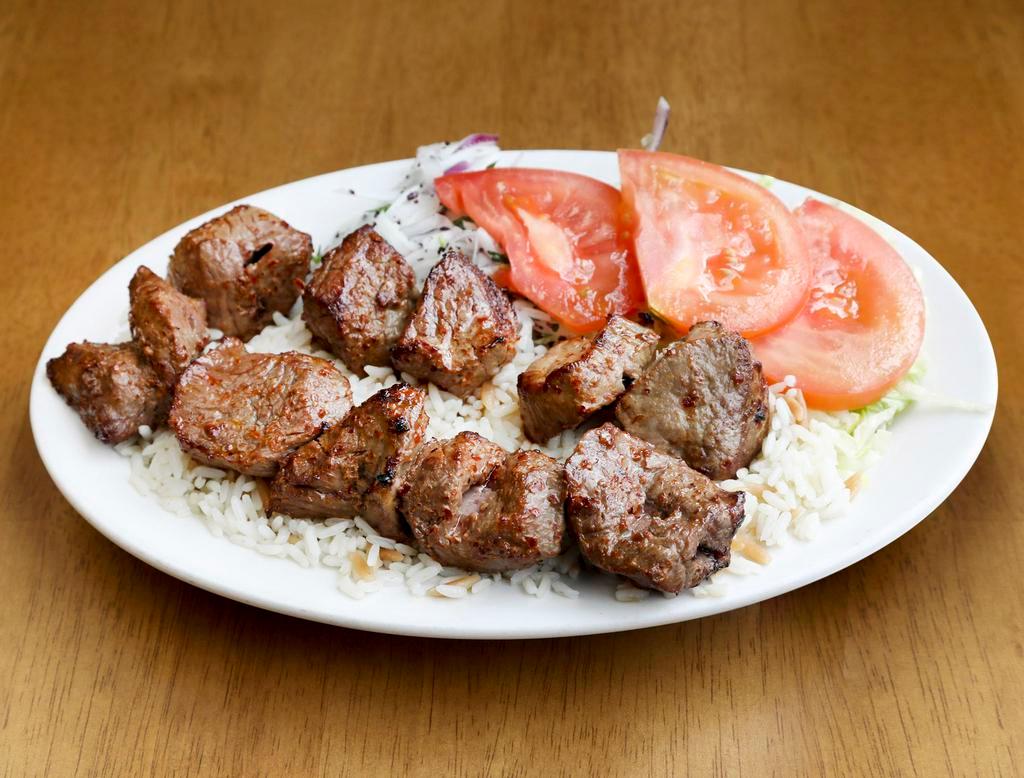 Shish Kebab · Chunks of baby lamb marinated in our sauce grilled over charcoal.