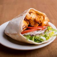Chicken Kebab Sandwich · Includes lettuce, tomato, onions and sauce.