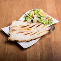 Trout · Whole trout delicate white meat served grilled. Served with salad.