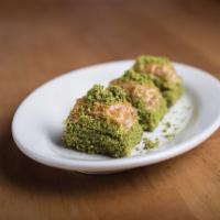 Baklava · Sweet pastry made with extremely thin sheet of phyllo dough layered with chopped nuts and ho...