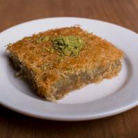 Kadayif · Sweet pastry made of extremely thin shredded wheat layered with chopped nuts and honey syrup.