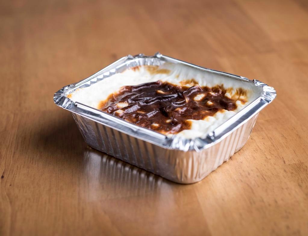 Rice Pudding · A pudding made by baking rice, milk and sugar.