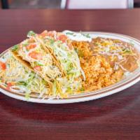1.Taco Platter Lunch · Choice of chicken, ground beef, shredded beef, or refried bean. 2 soft or hard shell tacos s...