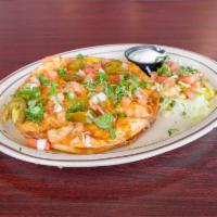 14. Mexican Pizza Lunch · 2 crisp flour tortillas stuffed with refried beans and choice of chicken, ground beef or veg...