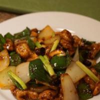 Cashew Delight · Stir-fried choice of protein with sesame oil, garlic, roasted cashew nuts, bell peppers, car...