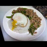 Minced Chicken with Basil · Stir fry minced chicken with basil and fried egg served over rice.