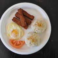 Chicken Sausage  · House-made sweet and spicy chicken sausage. Served with egg and choice of garlic or white ri...