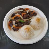 Beef Steak  · Pan sauteed Tri-tip beef steak with onion and bell peppers. Served with garlic or white rice.