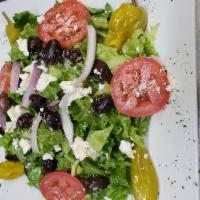 Large Greek Salad served two  · Romaine lettuce, red onions, fresh tomatoes, feta and romano cheese with kalamata olives.