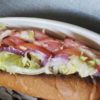 Torpedo   Italian' sub · mayo, Mustard, lettuce, tomatoes, onions, provolone cheese, oil and vinegar, and imported mo...