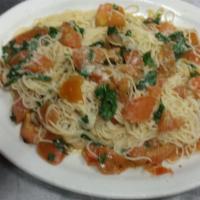Angel Hair Pomodoro · Fresh tomatoes, fresh basil in olive oil and garlic sauce. Includes garlic bread and small g...