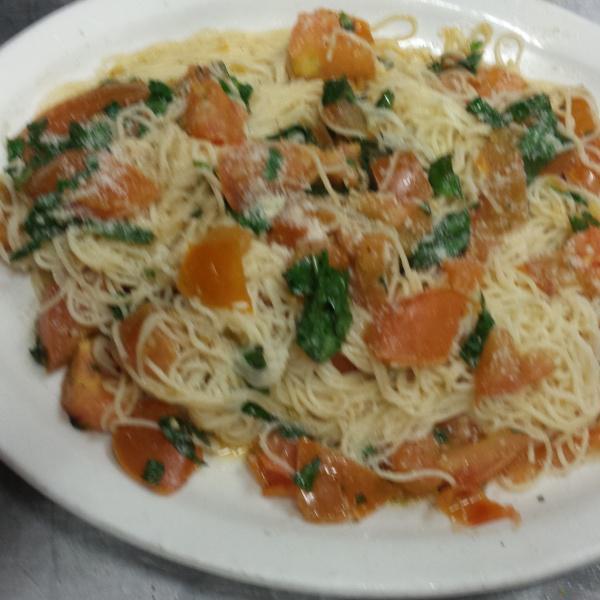 Angel Hair Pomodoro · Fresh tomatoes, fresh basil in olive oil and garlic sauce. Includes garlic bread and small garden salad.