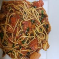 Spaghetti Arrabiata · Fresh basil, tomatoes, garlic, olive oil and pinot grigio, sauteed with mushrooms in spicy t...