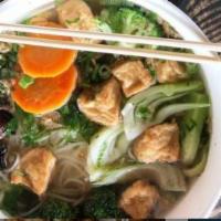 Vegetable Noodle Soup · Mushroom and Tofu. 100% vegetable based soup served with steamed tofu, mushroom, bok choy, c...