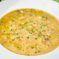 Pasta e Fagioli Soup · Cannellini bean soup with pasta, Prosciutto di Parma, onions, garlic and a touch of tomatoes.