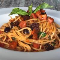 Spaghetti alla Puttanesca · Garlic, capers, anchovies, Kalamata olives, basil and fresh tomato sauce.