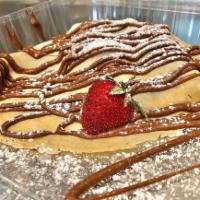 Crepe di Nutella    · Crepe filled with fresh strawberries and hazelnut-chocolate spread, served  with vanilla ice...