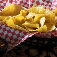 Chips ＆ Salsa · Fresh housemade corn tortilla chips and housemade salsa with fresh vegetables.