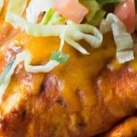 Smothered Burrito · Burritos are stuffed with your choice of meat, Mexican rice, refried or black beans, mixed c...
