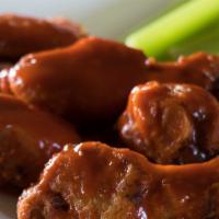 Mango Habanero Wings · Spicy level 2. Tender bone-in chicken wings smothered in our original mango habanero sauce, ...