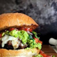Spicy Guacamole Burger · Guacamole, Pepper Jack Cheese, Fresh Jalapeno Slices, Chipotle Mayo.  Served with red onion,...