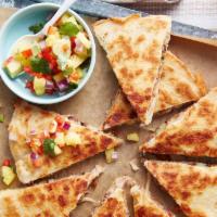 Quesadilla (Entrée Size) · Made with shredded chicken or ground beef and melted cheese. Includes Mexican rice and refri...