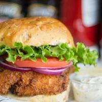 Crispy Fish Sandwich · Large white fish filet battered and fried to perfection. Served with lettuce, tomato, onion ...